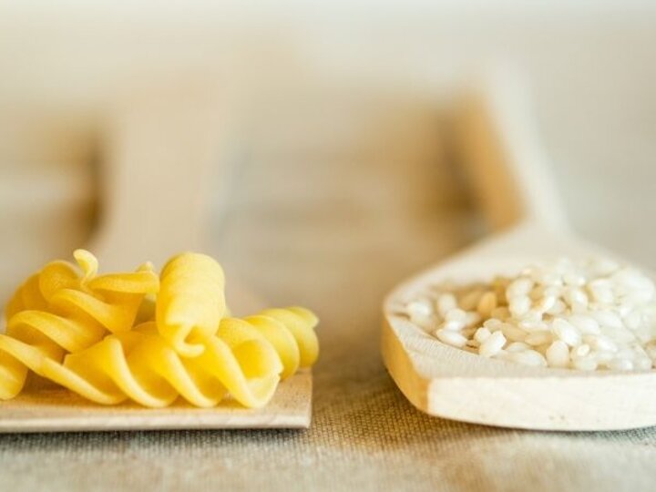 pasta and rice on spoons