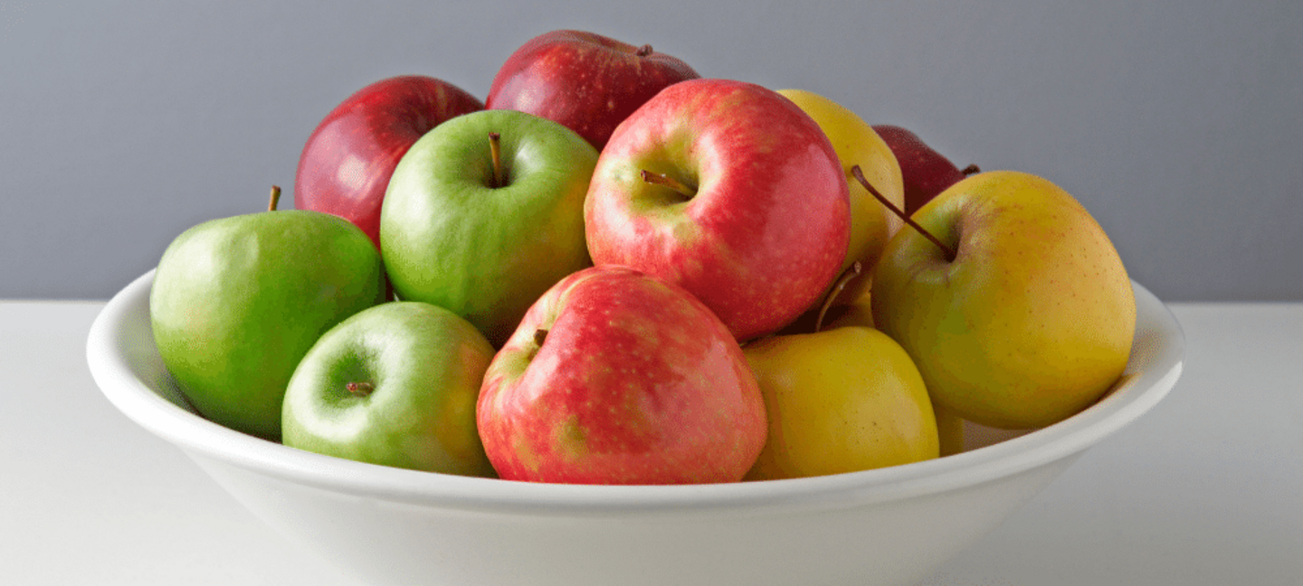 variety of apples in a bowl