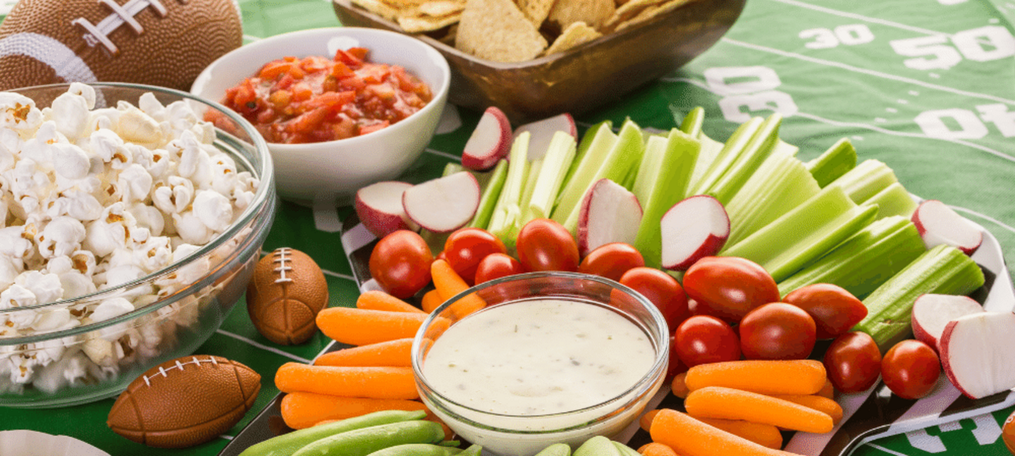 variety of football party snacks on a table