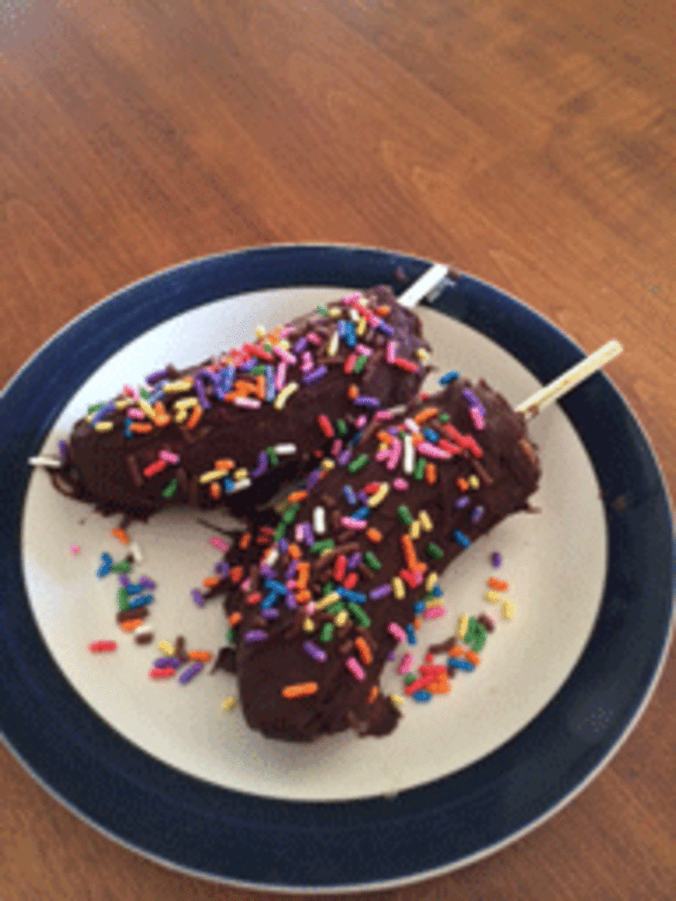 Chocolate banana pops on a plate