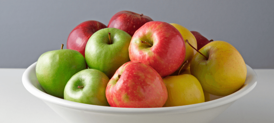 variety of apples in a bowl