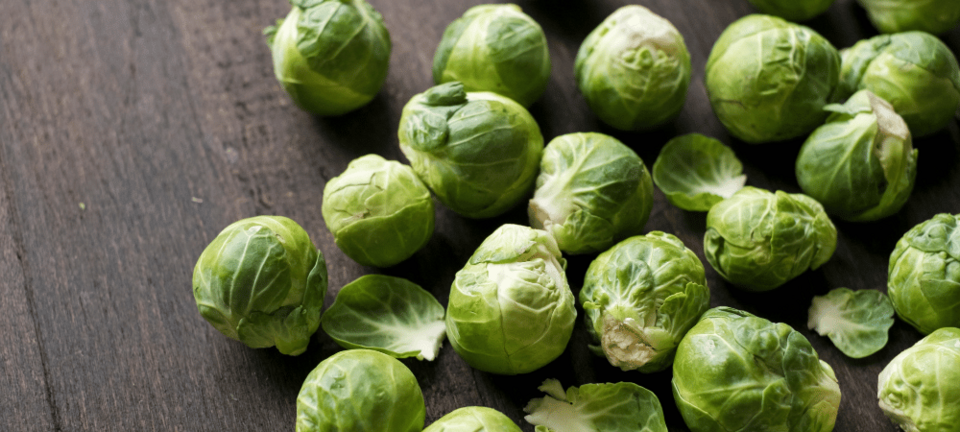 Brussels sprouts on wood table