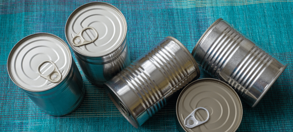 group of canned food on a table