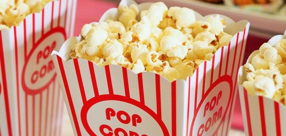 popcorn in red and white tub