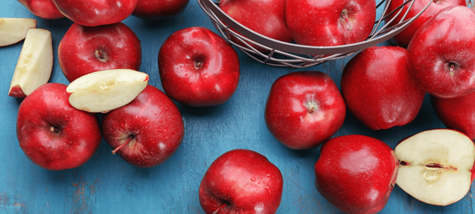 red delicious apples on table