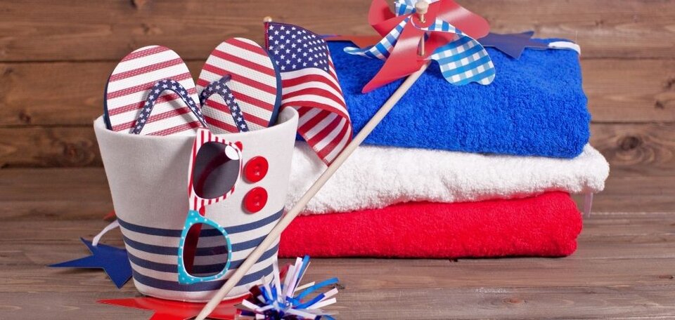 red, white and blue towels, bucket, flip flops