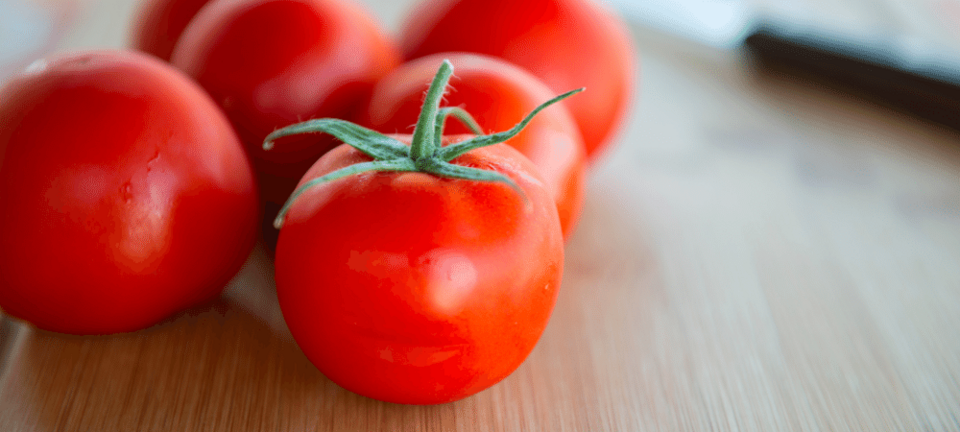 fresh tomatoes on a table