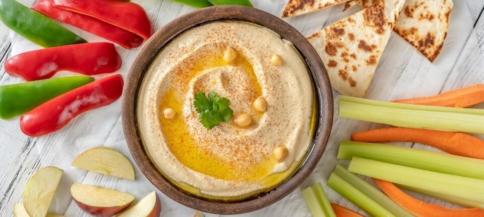 hummus with vegetables, fruit and bread