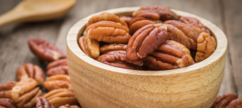 pecans in a bowl on a table