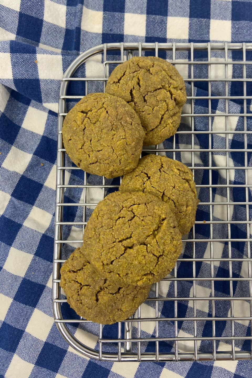 Sunflower cookies on a cooling rack