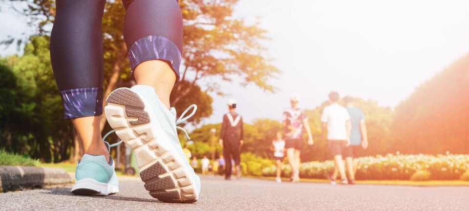 walking shoes and people walking