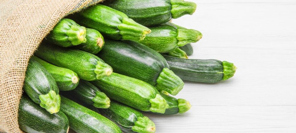 zucchini in a burlap bag