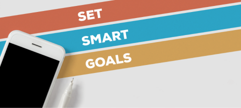 set smart goals by using a pencil or an electronic device