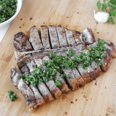 Steak sliced with chimichurri sauce