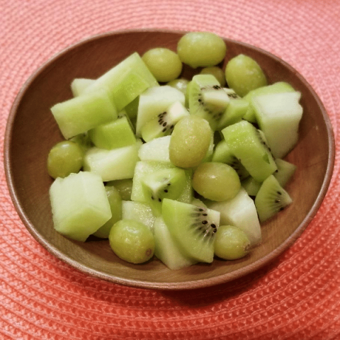 bowl of kiwi, green grapes, and honeydew