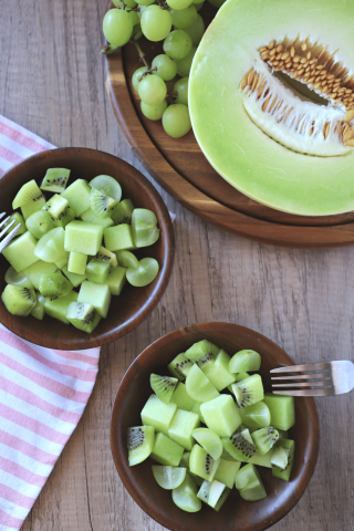 Bowl of kiwi, green grapes, and honeydew melon