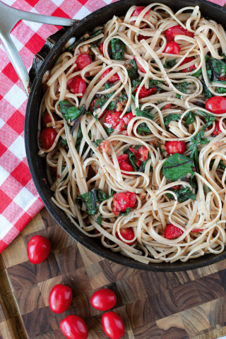 Noodles with tomatoes and Swiss chard