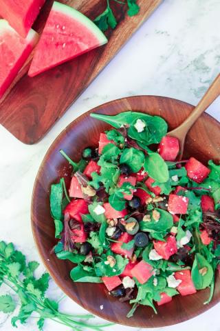 Refreshing watermelon salad with spring greens