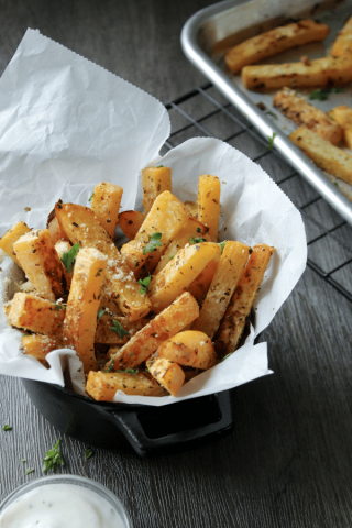 Rutabaga fries in parchment paper cup