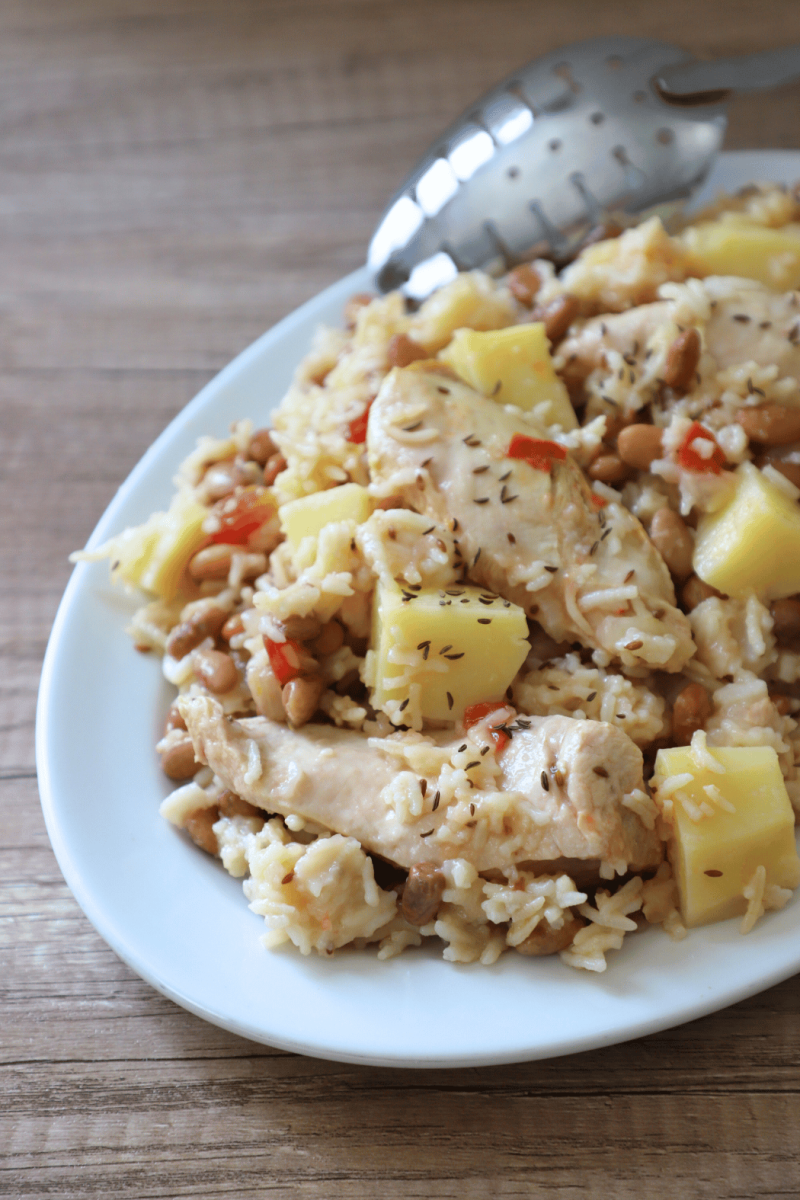 Chicken with rice, potatoes and beans. 